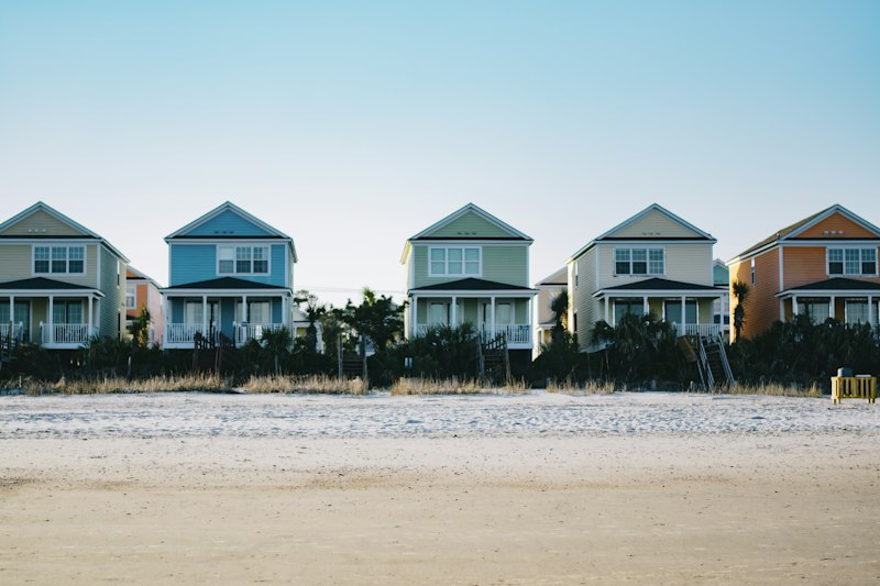 Row of colorful two-story beach houses